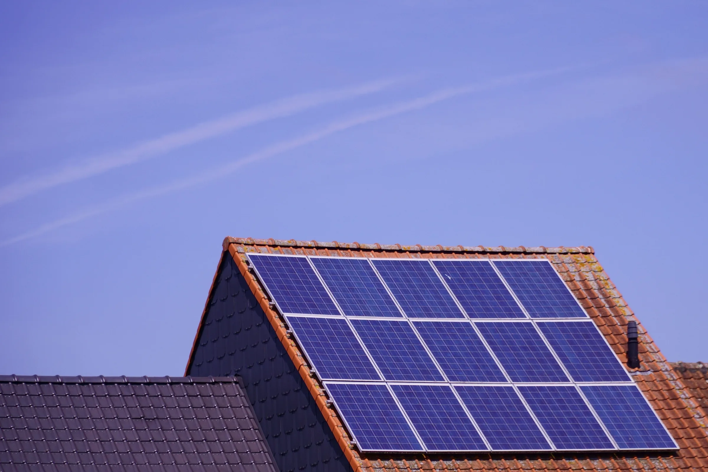 Rooftop solar panels on a tiled residential roof